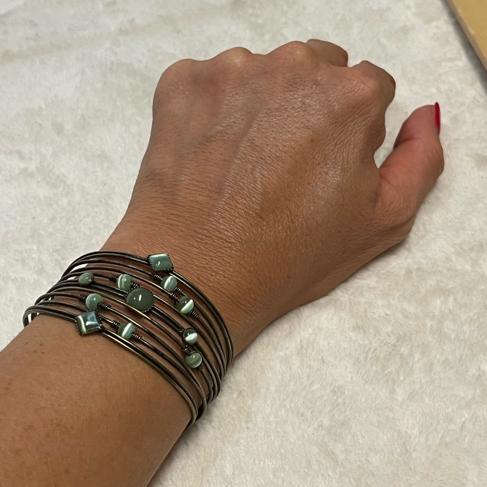 vintage cuff bracelet with green stone accents